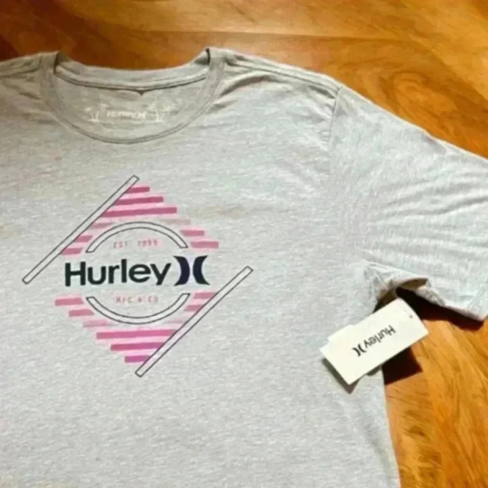 Hurley New With Tags Gray and Pink Men's T-Shirts in Various Sizes.